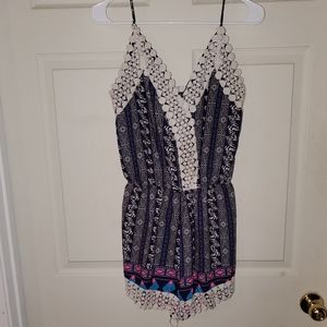 Lot of womens clothing, 6 shirts and 1 romper